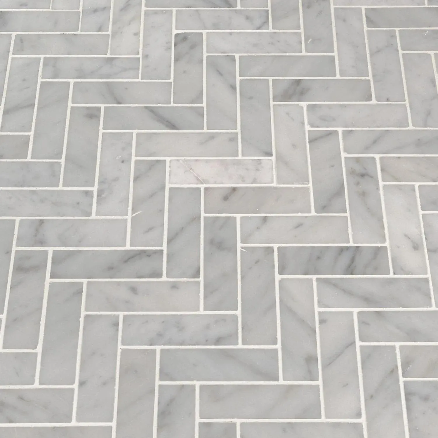 Carrara Herringbone Pattern White-Cool Polished 12" x 12" SMOT-CAR-1X3HBP MSI Surfaces Rectangle Mosaic Tiles