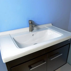 Image 4 of 32'' Wall-Mounted Solid Wood Espresso Vanity with Ceramic Sink sold at Floors & Baths Pro's